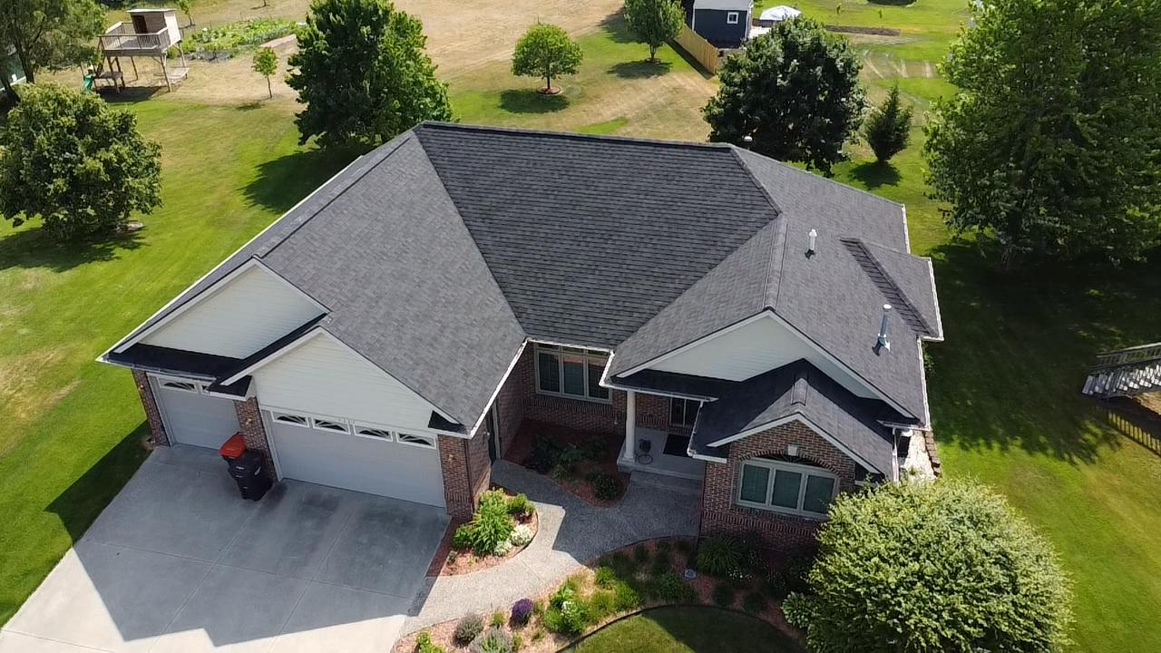 Aerial view of house showing roof.